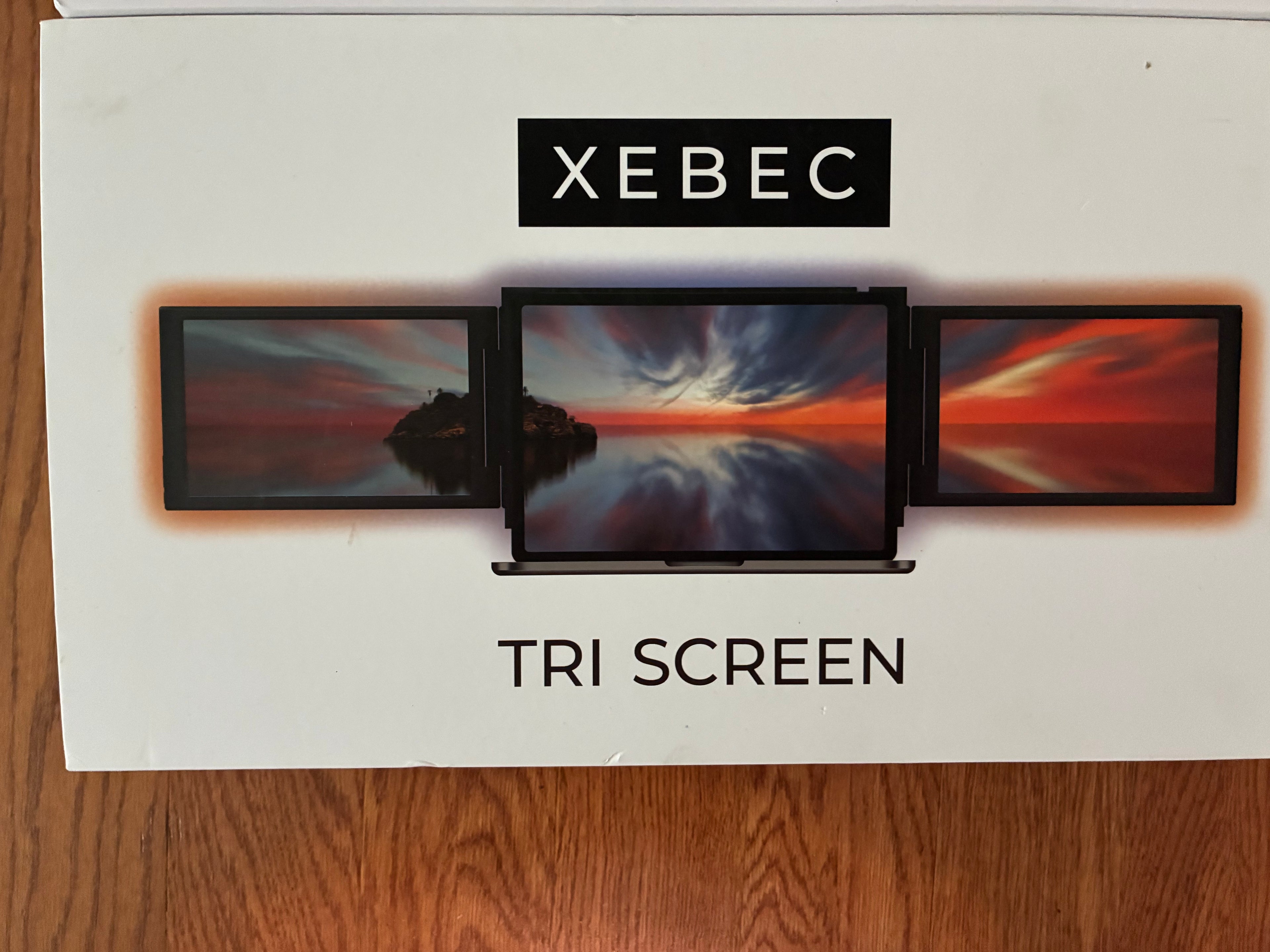 Xebec Tri-Screen Portable Laptop Monitor  Create a multi-monitor workstation wherever you work.
